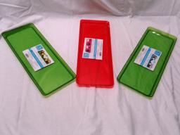 Three plastic Trendware Serving Trays