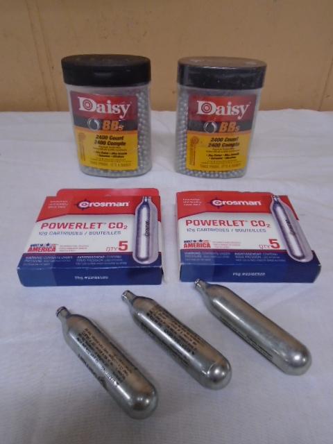 (13) Crossman CO2 Powerlet Cartridges and (2)2400 Count Daisy BB's