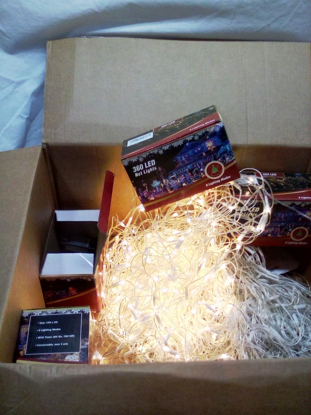 4 boxes unpacked of 360 LED Net Lights