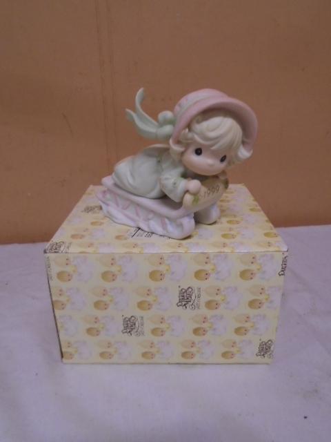 Precious Moments Sledding Figurine