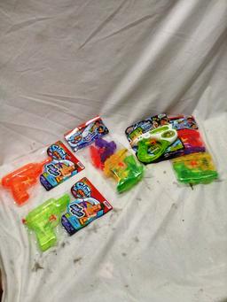 Qty. 5 Packs of Misc. Water Squirt Guns