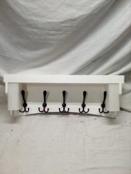 Wall shelf with hooks