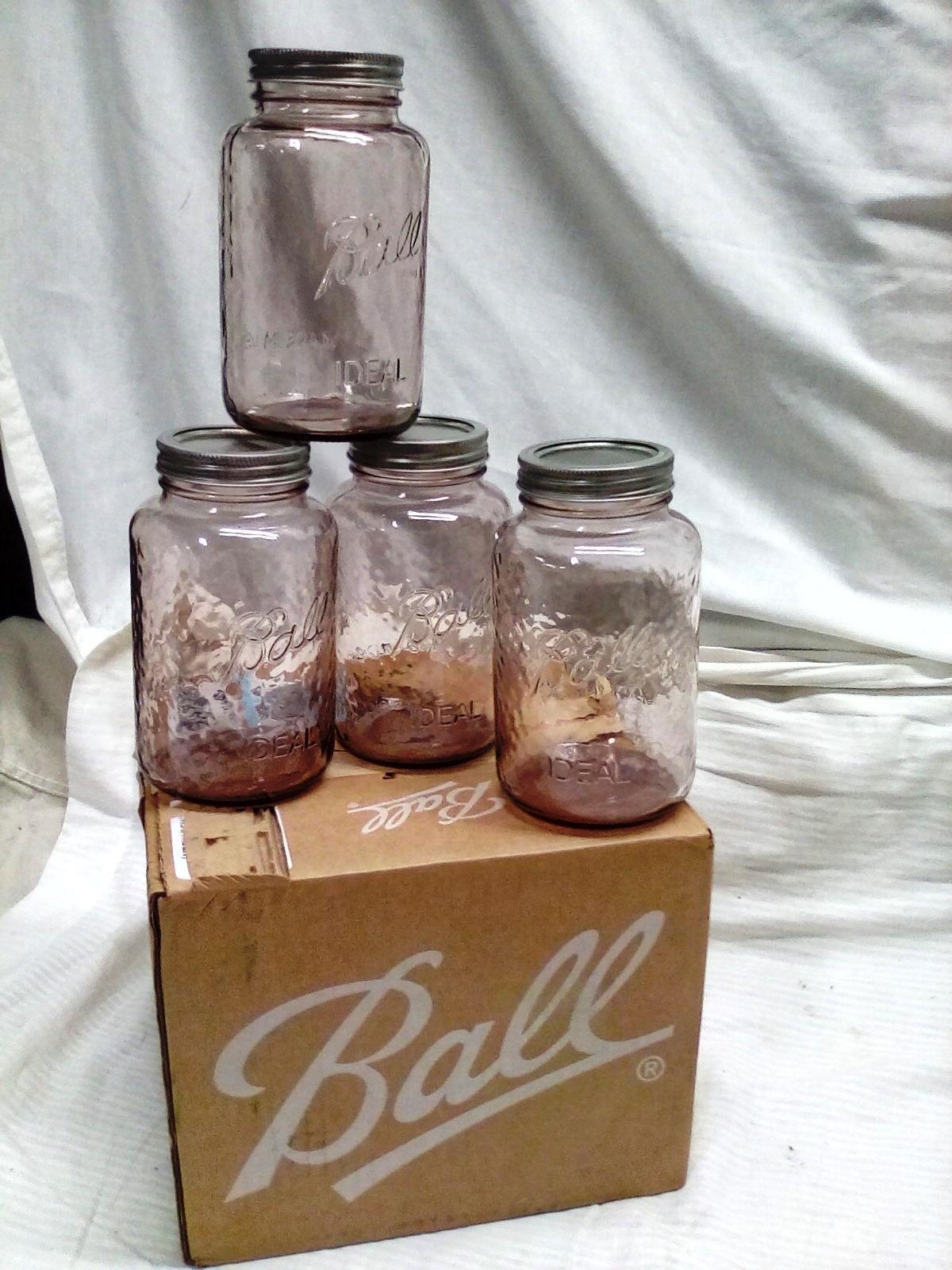 Qty. 4 Decorative 1 Quart Ball Jars with lids