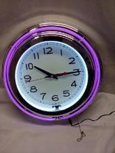 Double Ring Light Up Purple Wall Clock.