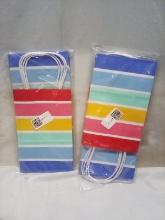 Qty 2 Packs of 4 Small Gift Bags.