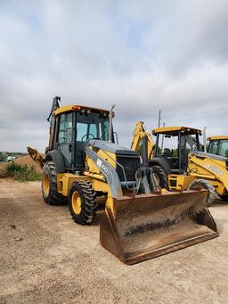 2007 John Deere 410J Backhoe Loader W/ 1.5 cu/yd Bucket & W/ Self Aligning Rolle