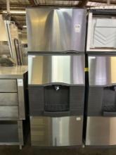 Manitowoc. 500 lb. Water Cooled Ice Maker on SPA310 Ice Dispenser Bin