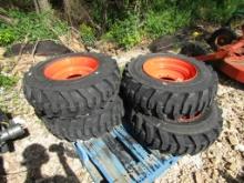 (4) NEW 10-16.5 ORANGE SKID STEER TIRES AND RIMS