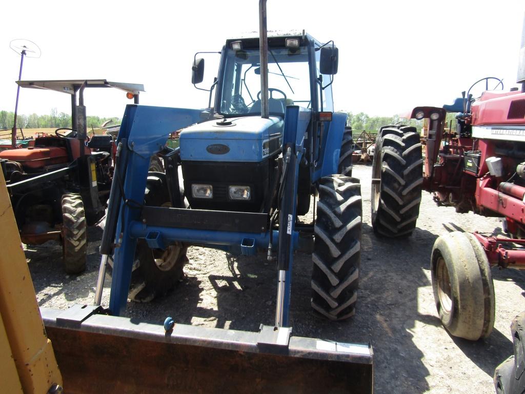 7840 FORD TRACTOR W/ CAB AND LOADER