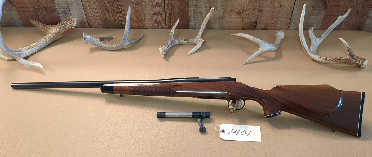 REMINGTON MODEL 700 BOLT ACTION BDL VARMINT .220 SWIFT RIFLE