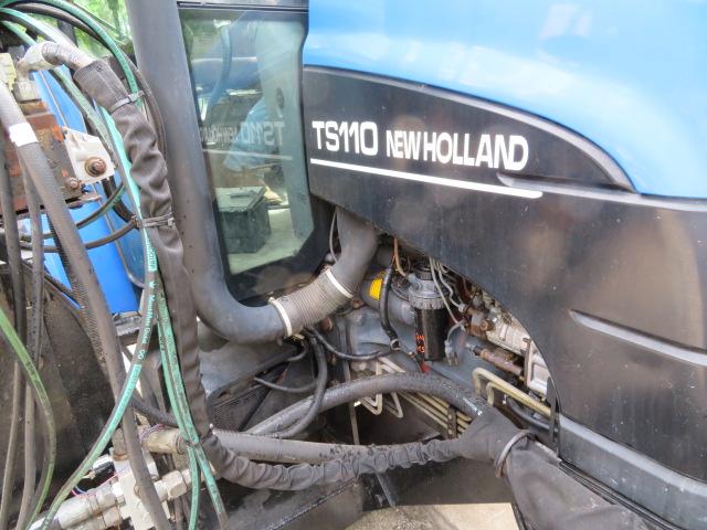 New Holland TS110 Tractor w/Alamo boom mower