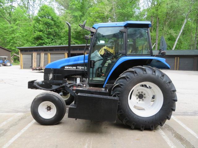 New Holland TS110 Tractor w/Alamo boom mower