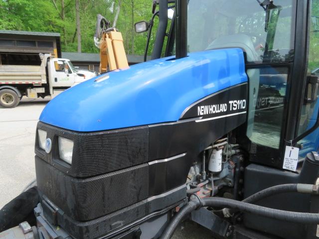 New Holland TS110 Tractor w/Alamo boom mower