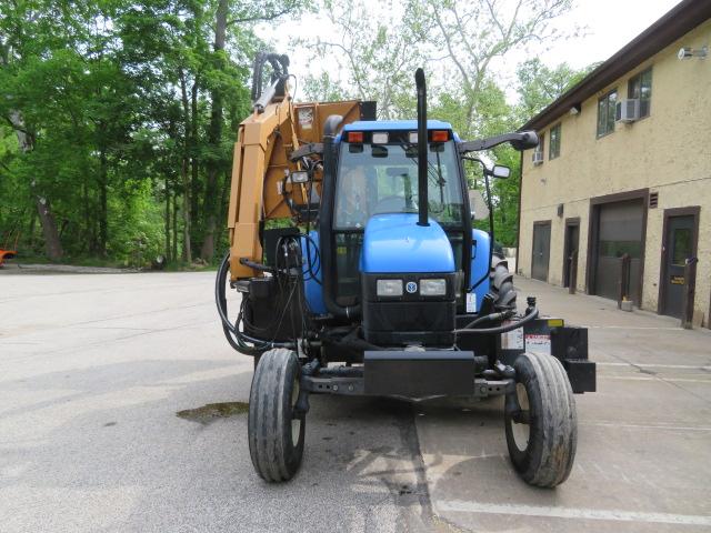 New Holland TS110 Tractor w/Alamo boom mower