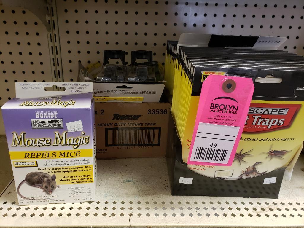 Large assortment of rodent, flea, and fly killer, traps, etc. New.