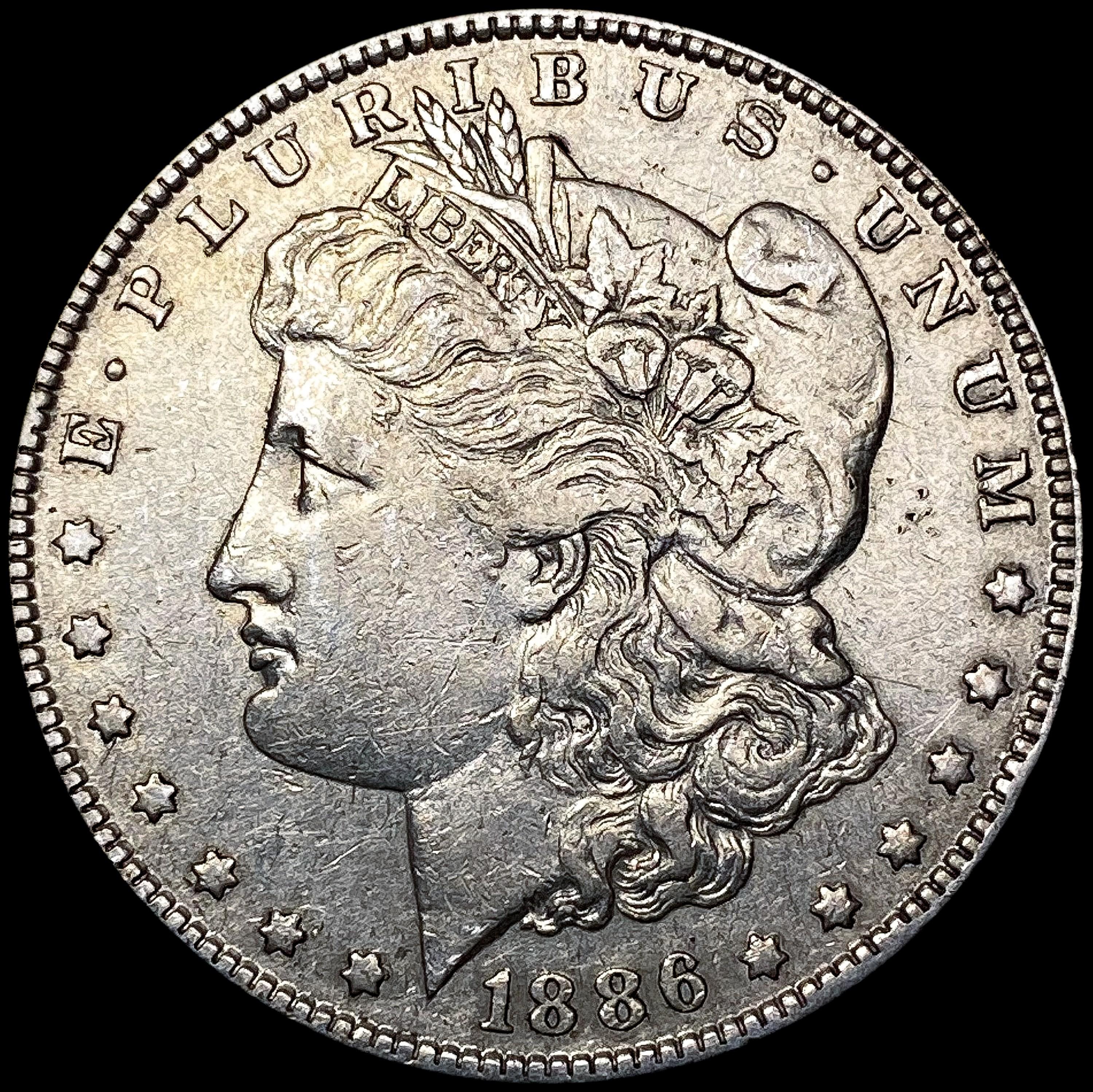 1886-O Morgan Silver Dollar CLOSELY UNCIRCULATED