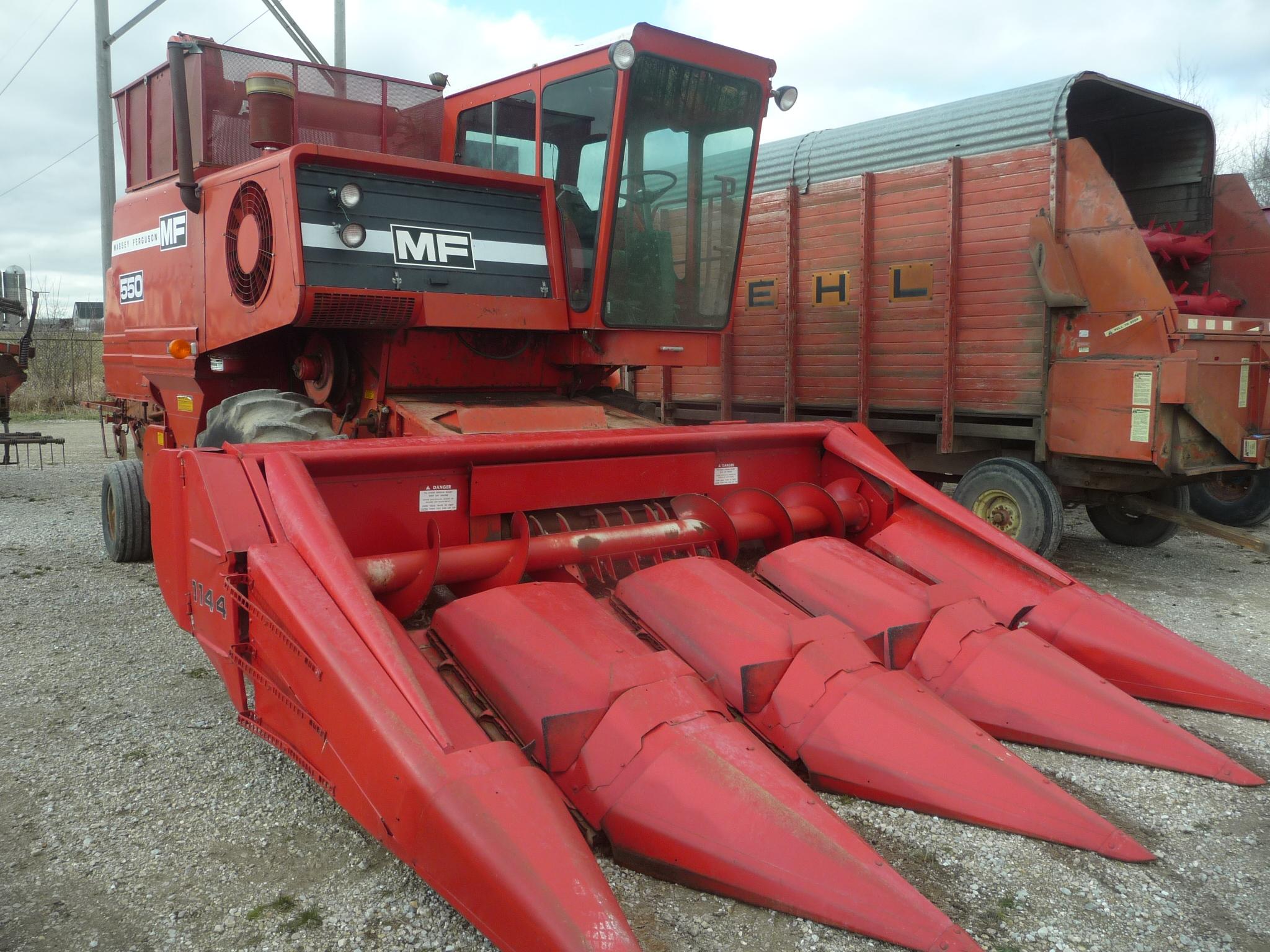 MF 550 diesel combine w/1144 4RW corn head, 2950 hrs, gear drive, 18.4x26