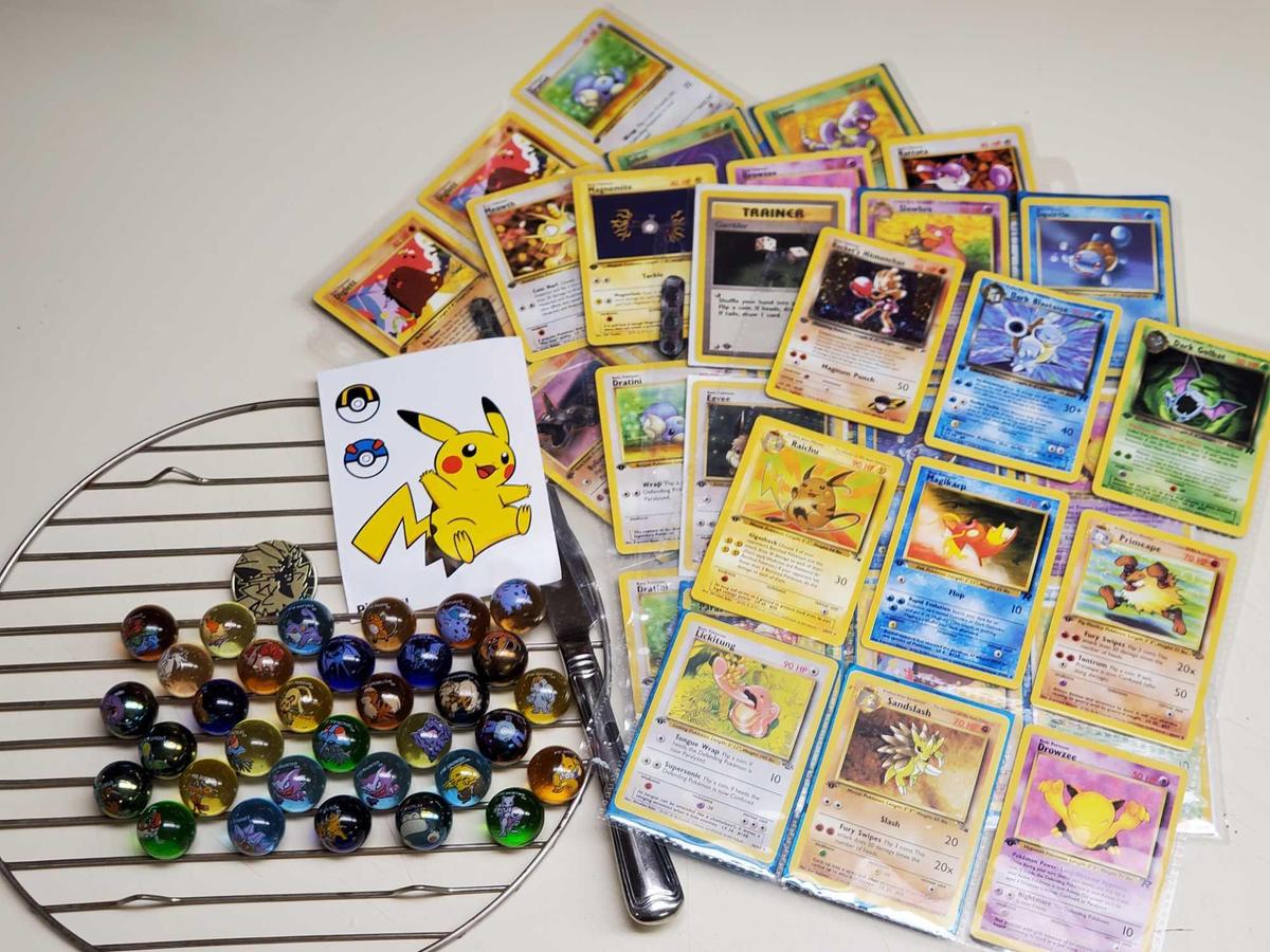 39 First Edition, 2 World Championship Signed, 1 Pocket Monster Card, and 34 Pokemon Marbles