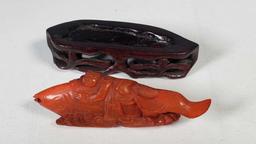 Carved Horn Tall Figure and Petite Carving of Child Riding Koi Fish