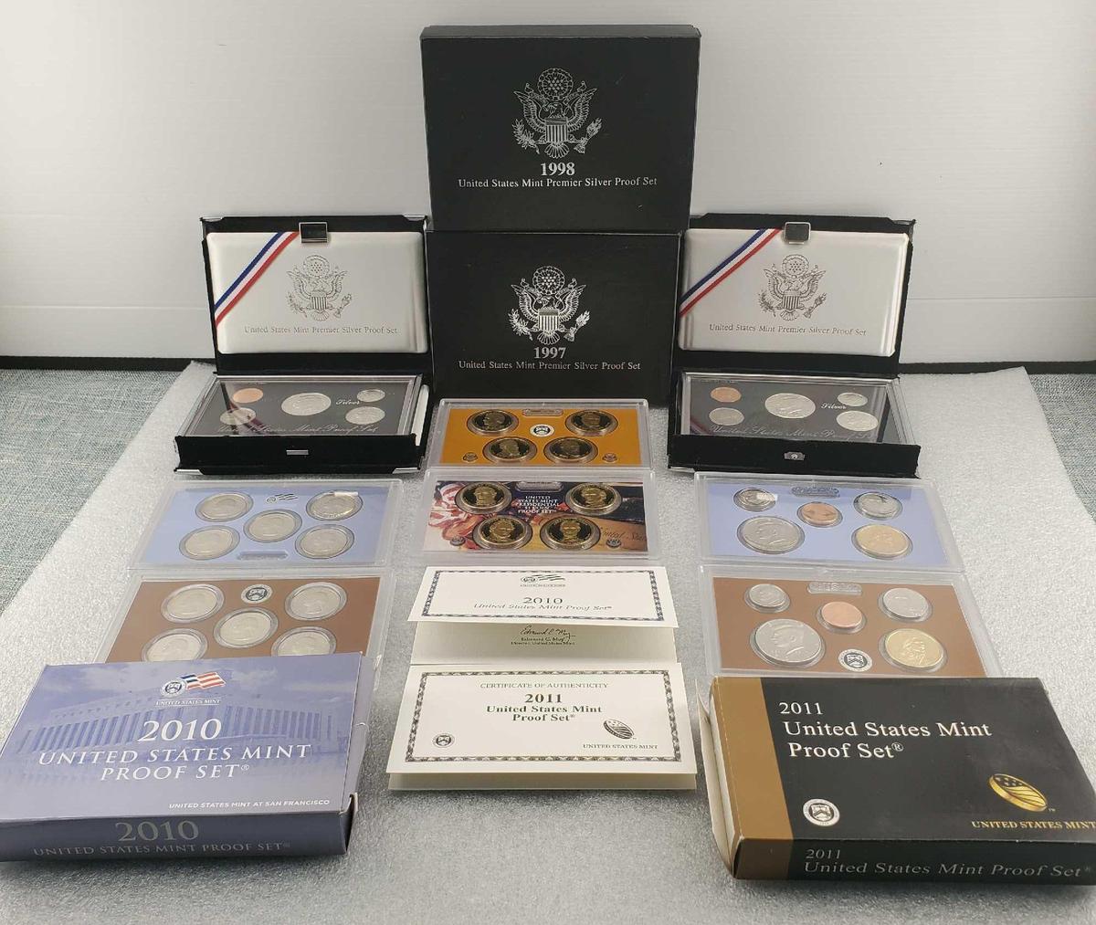 Lot Of 4 United States Premier Proof & Presidential Proof Sets In Cases And Boxes.