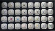 Tray Lot of 32 Facet Cut Mixed Gemstones in Display Case