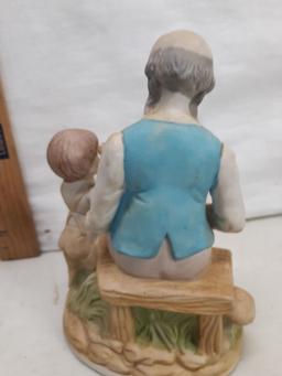 two ceramic figurines