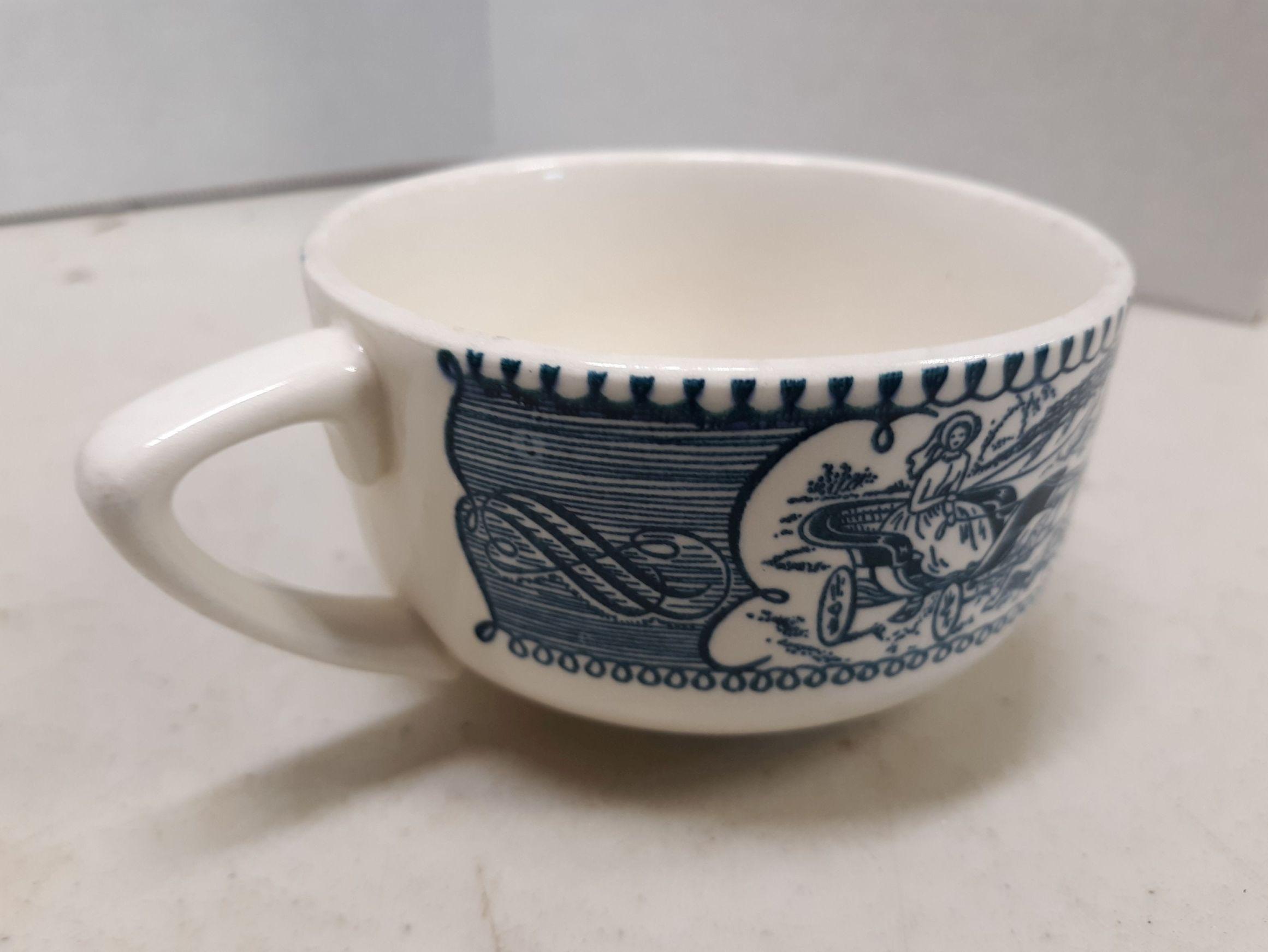 Four blue Currier and Ives coffee cups, Lady Driving Wagon