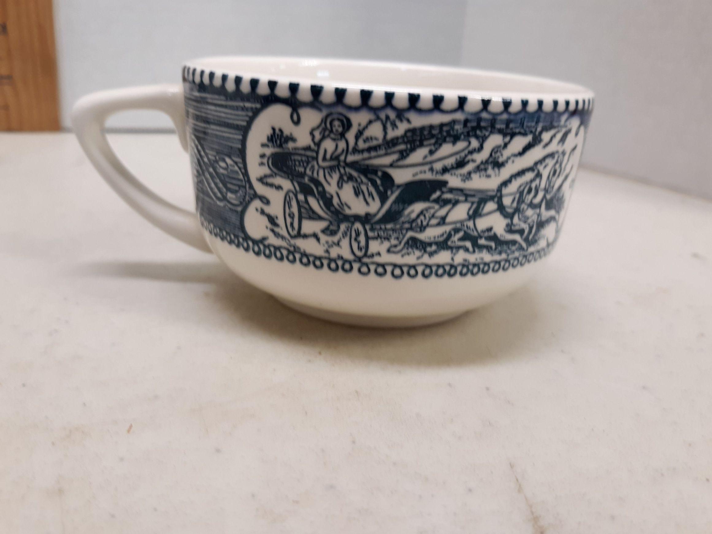 Four blue Currier and Ives coffee cups, Lady Driving Wagon