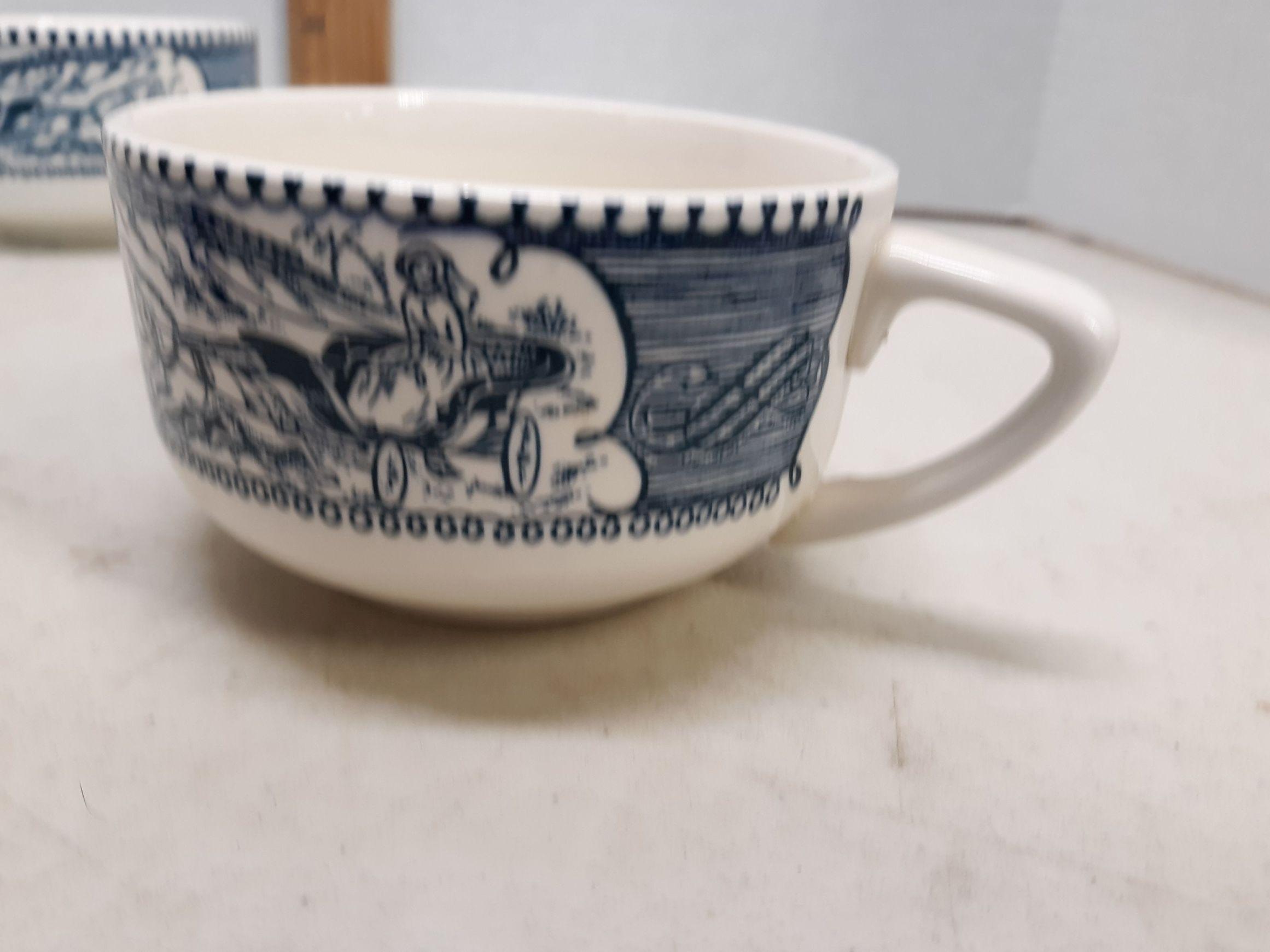 Four blue Currier and Ives coffee cups, Lady Driving Wagon