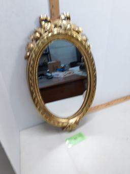 Home interior gold mirror