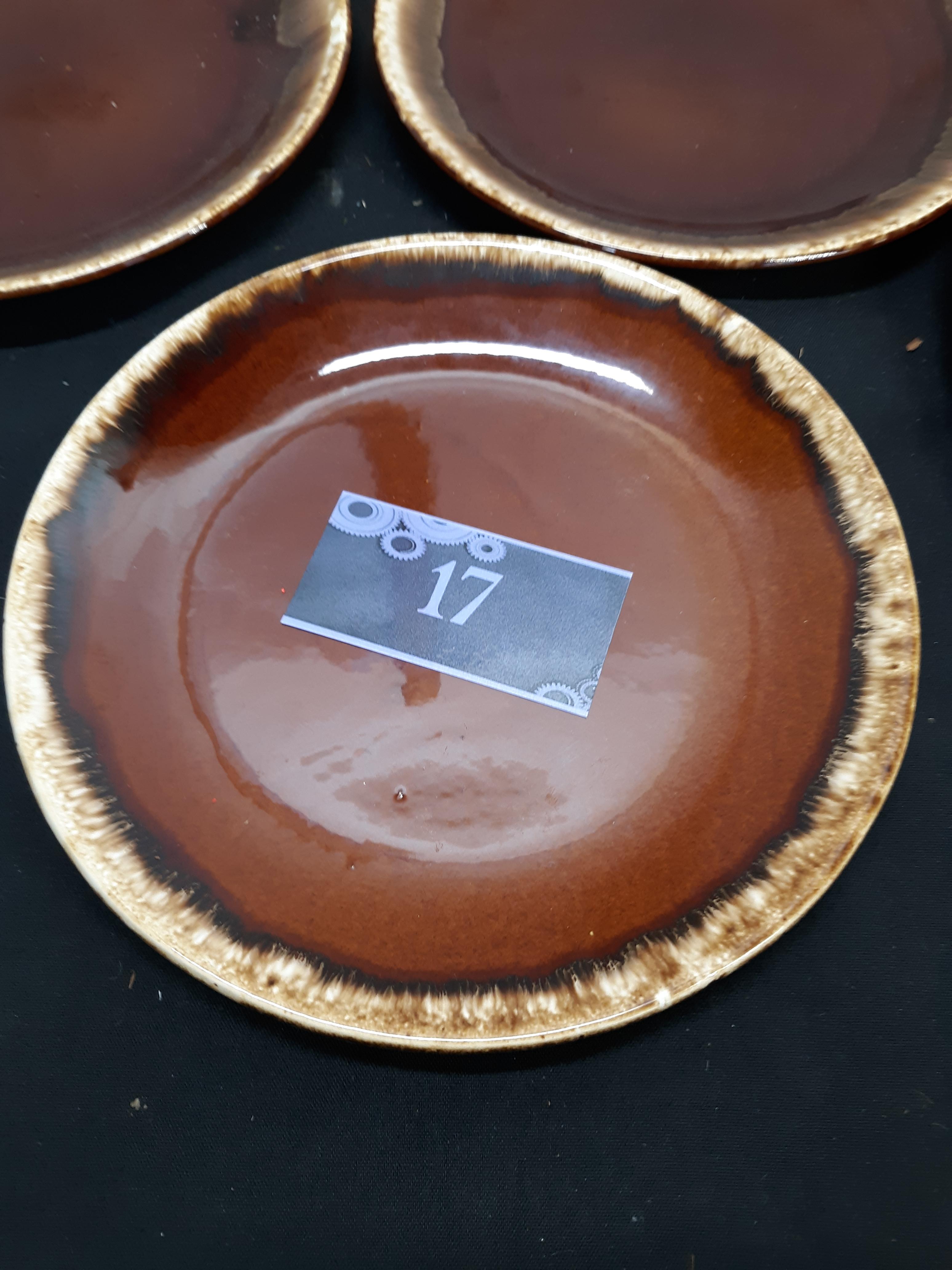 Four brown drip dinner plates