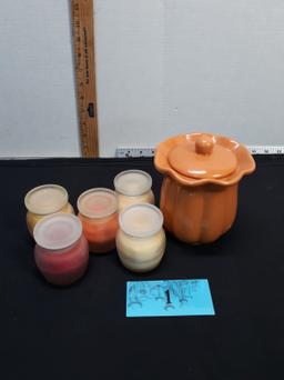 Candles in glass and ceramic containers