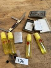 Box Lot/ZIPPO Lighters, Fuel, Uncle Henry Pocket Knife, Belt Buckle
