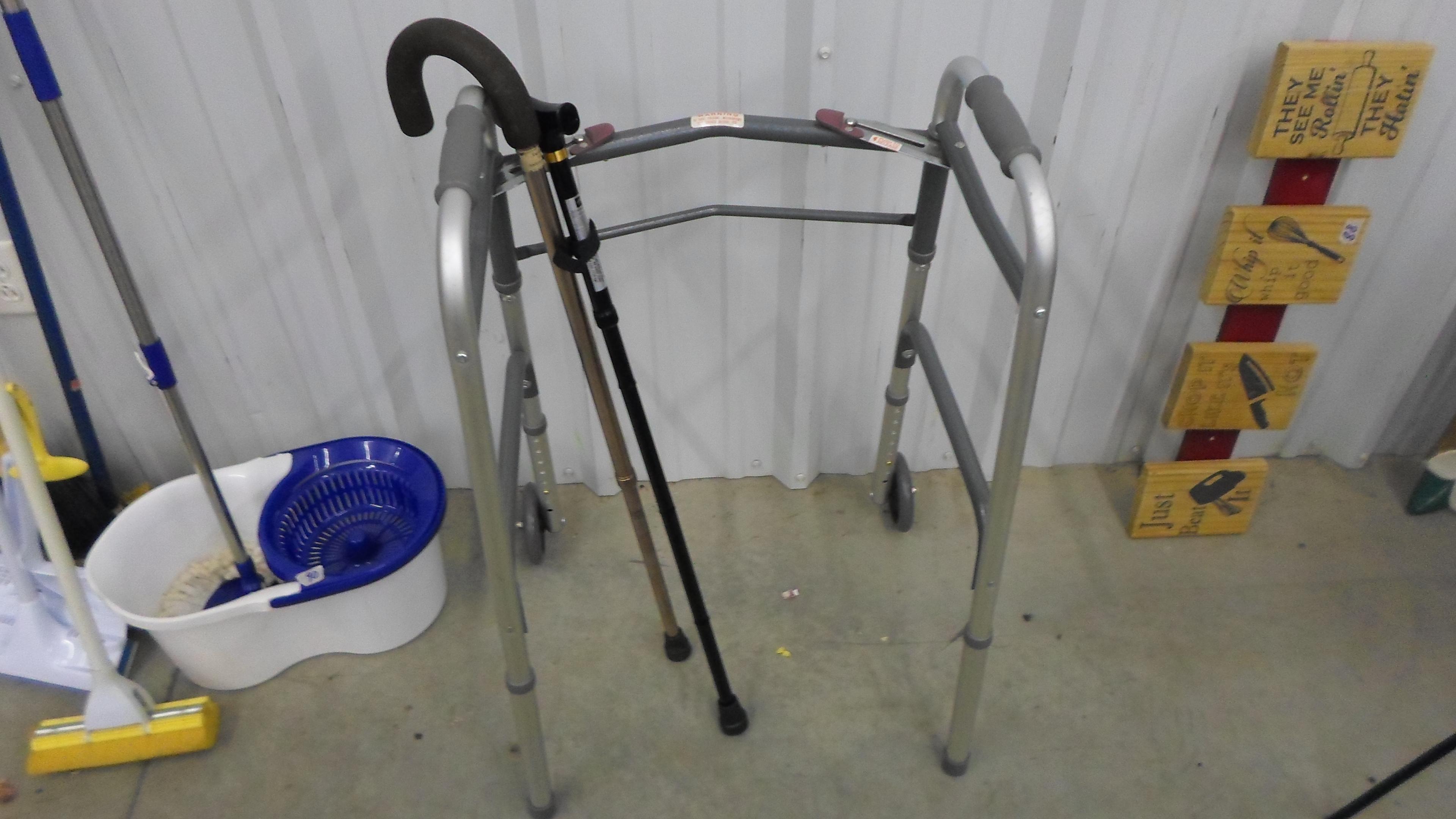 home health, nice grouping of like new canes, walker, and shower seat