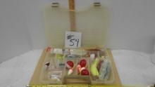 tackel box, fishing tackel and lures alot of corks and bobbers