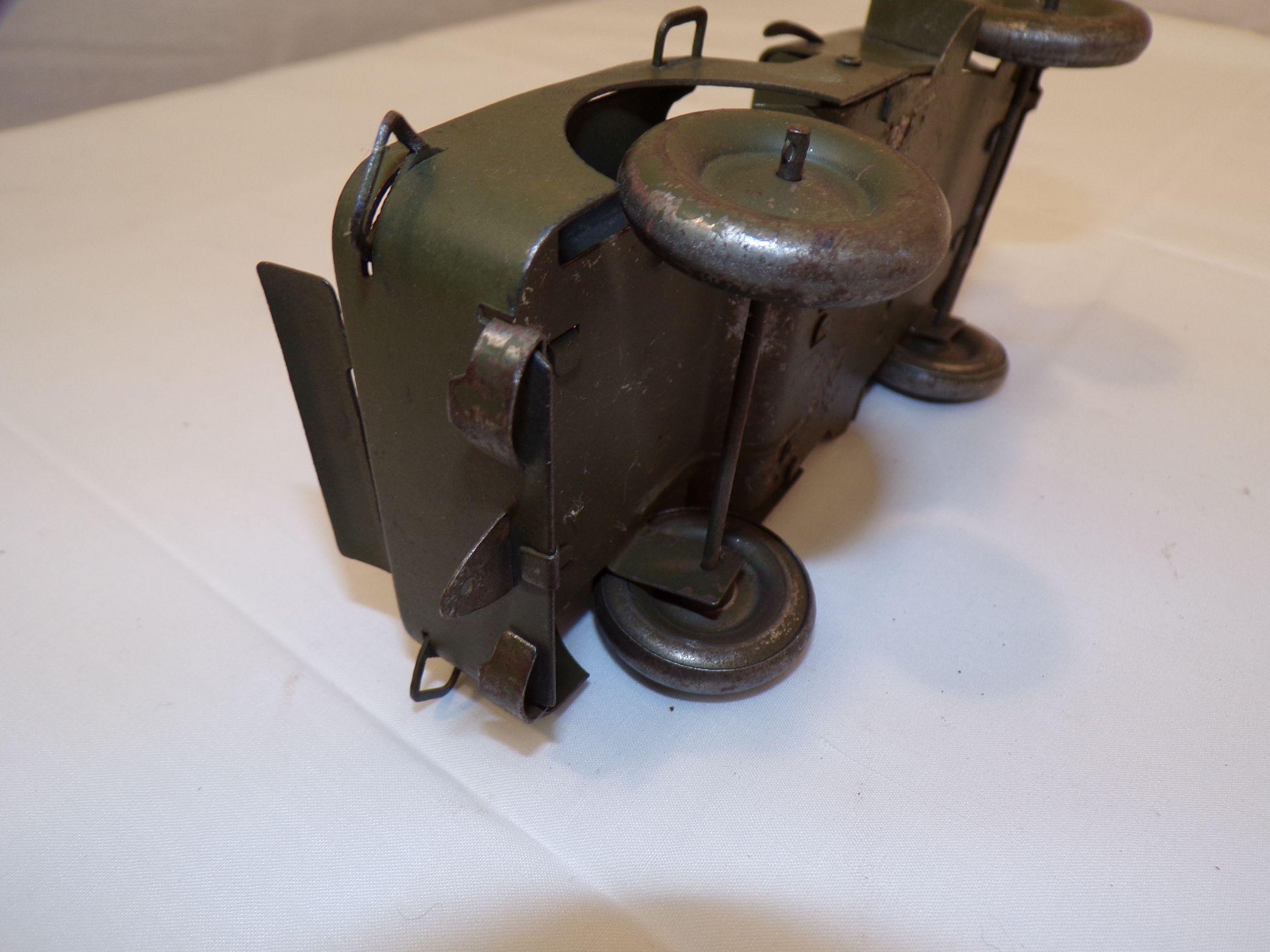 Early Pressed Steel Army Jeep and Figurine