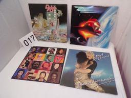 Lot of 4 records- 33 1/3 RPM's- LP Records- ZZ Top, The Who, Rod Stewart, Foghat