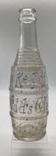 Figural "Keg O Kid’s Cola" Soda Bottle