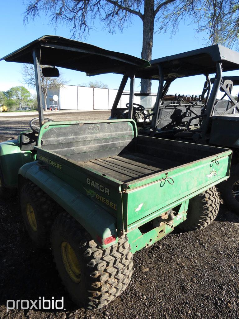 JD GATOR (DIESEL) (SHOWING APPX 4,090 HOURS) SERIAL # W006X4_____38 (ONLY LEGIBLE NUMBERS THAT COULD