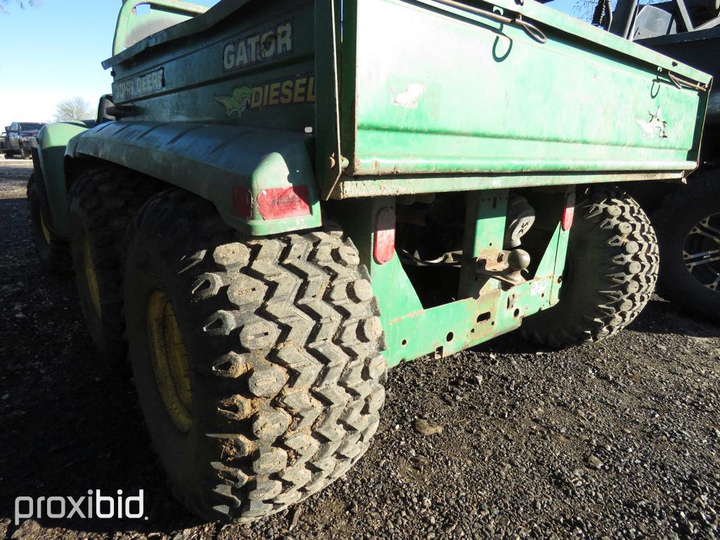 JD GATOR (DIESEL) (SHOWING APPX 4,090 HOURS) SERIAL # W006X4_____38 (ONLY LEGIBLE NUMBERS THAT COULD