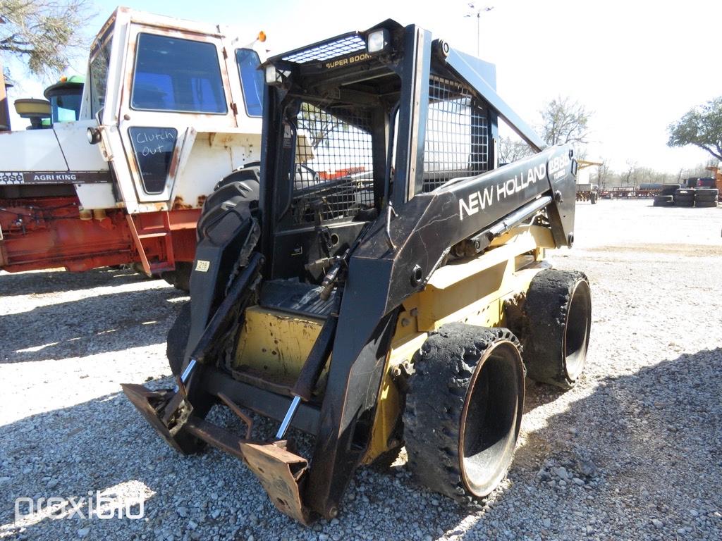 NH LX885 SKID STEER (SHOWING APPX 2,390 HOURS,UP TO BUYER TO DO THEIR DUE DILLIGENCE TO CONFIRM MILE