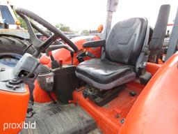 KUBOTA M7040 TRACTOR W/ LA1153 FRONTEND LOADER AND M4011 BACKHOE ATTACHMENT (SHOWING 435 HOURS) (SER