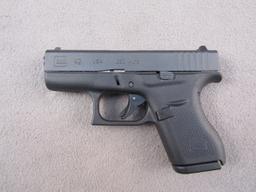 handgun: GLOCK Model 42, Semi-Auto Revolver, .380, 6 shot, 3" barrel, S#ACPU503