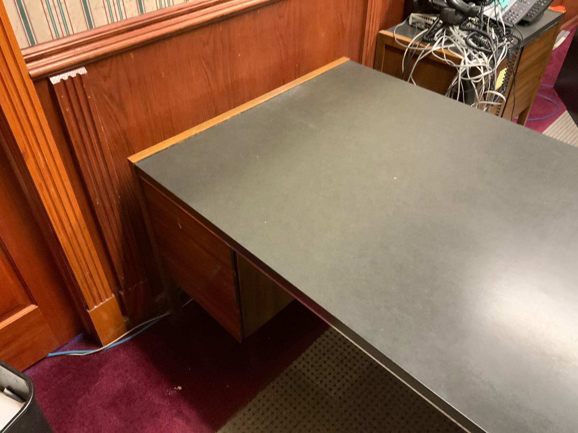 Desk 70 inches wide by 35 inches deep Pickup will be on Monday 3/29 from 1-6 pm at 1324 S. 119th