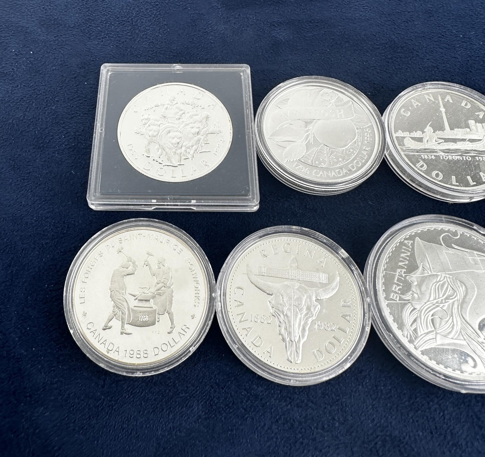 Collection Of Canada Silver Dollar Coins