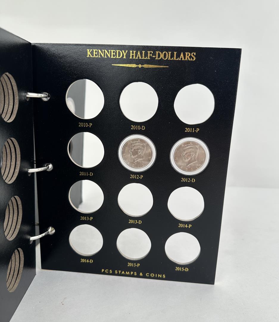 Partial Set Of Kennedy Half Dollar Coins in Album