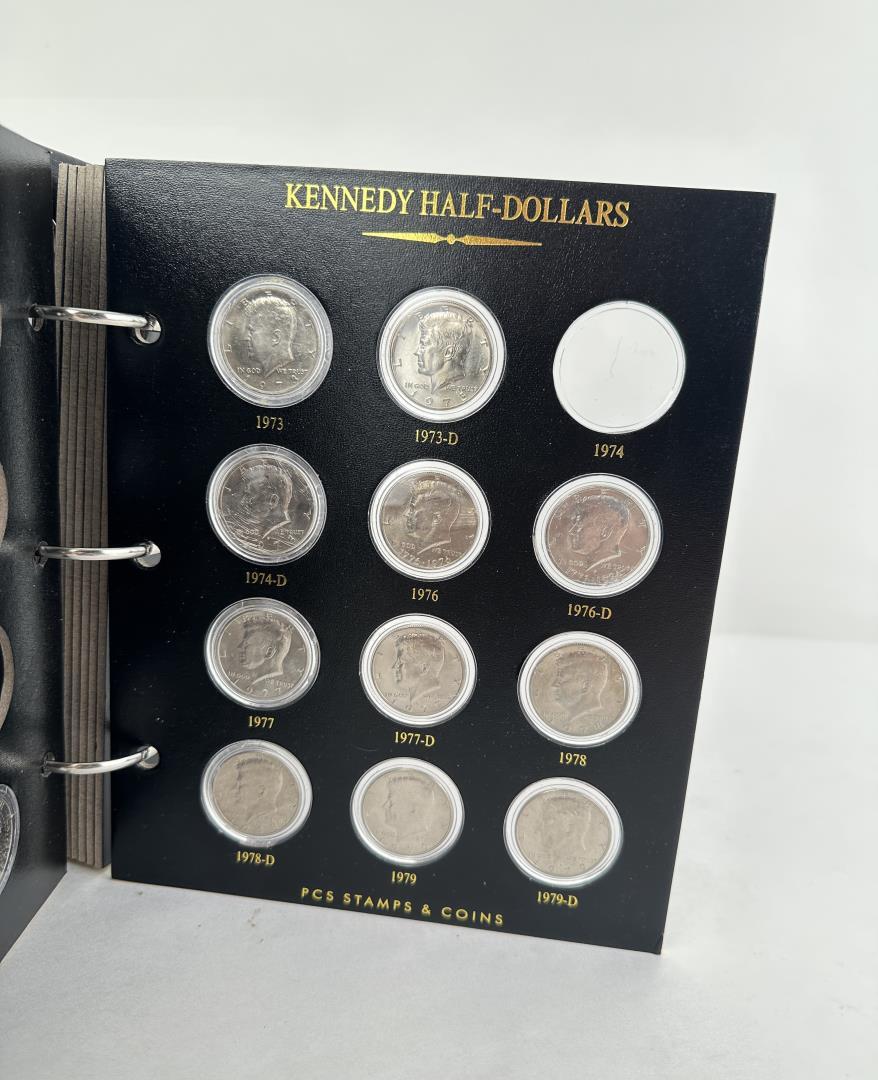 Partial Set Of Kennedy Half Dollar Coins in Album