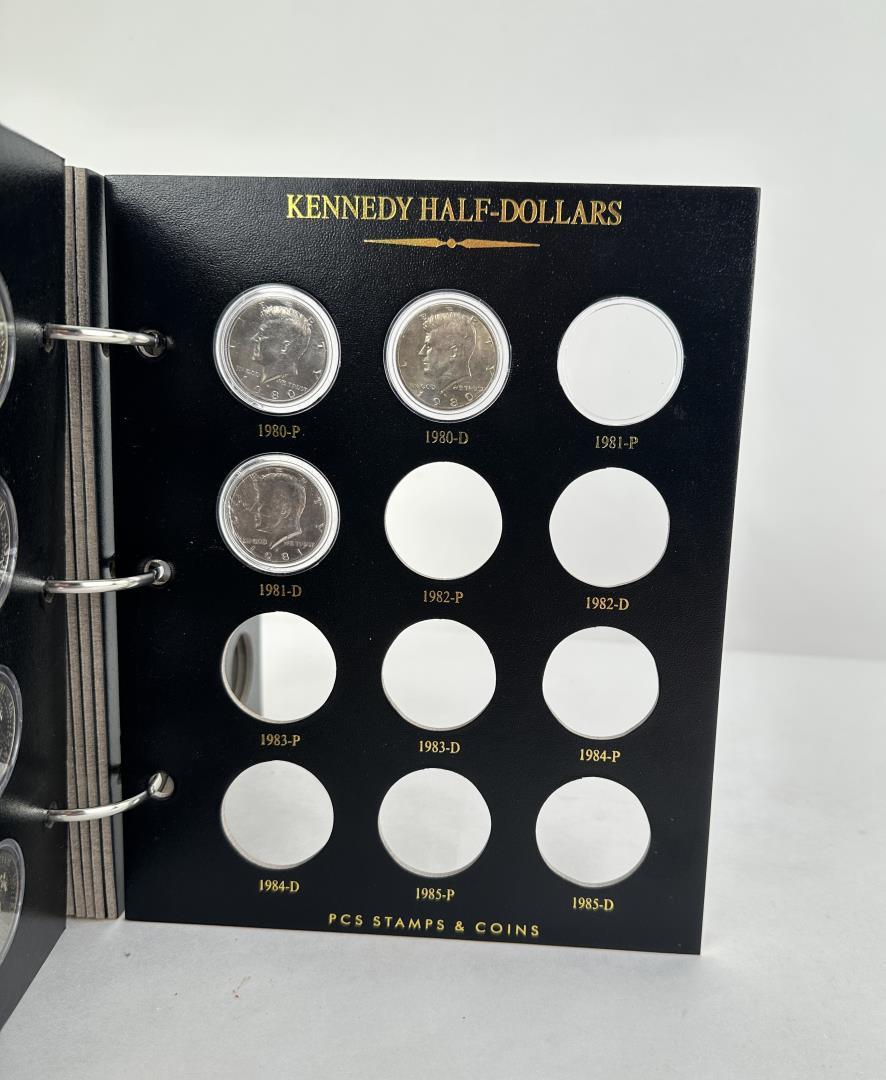 Partial Set Of Kennedy Half Dollar Coins in Album