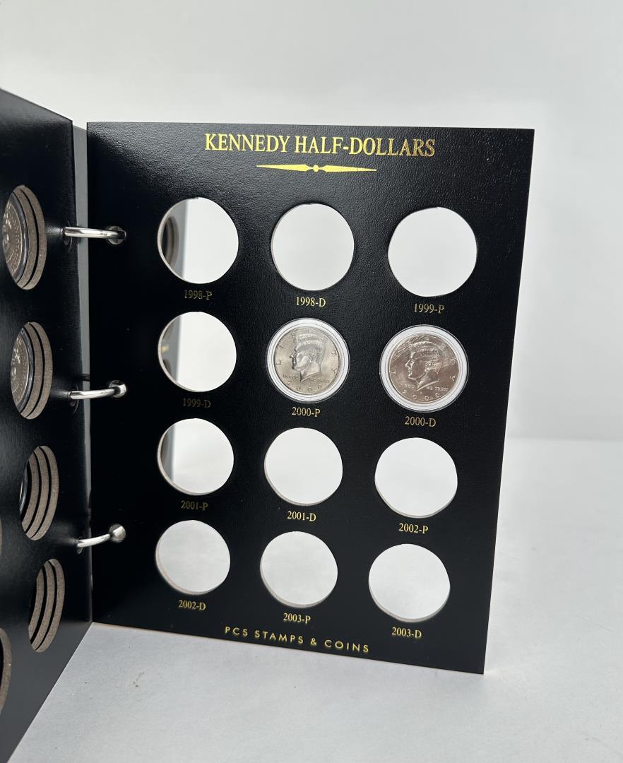 Partial Set Of Kennedy Half Dollar Coins in Album