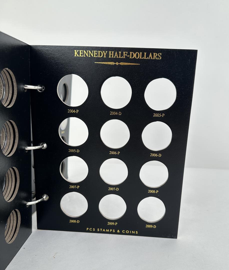 Partial Set Of Kennedy Half Dollar Coins in Album